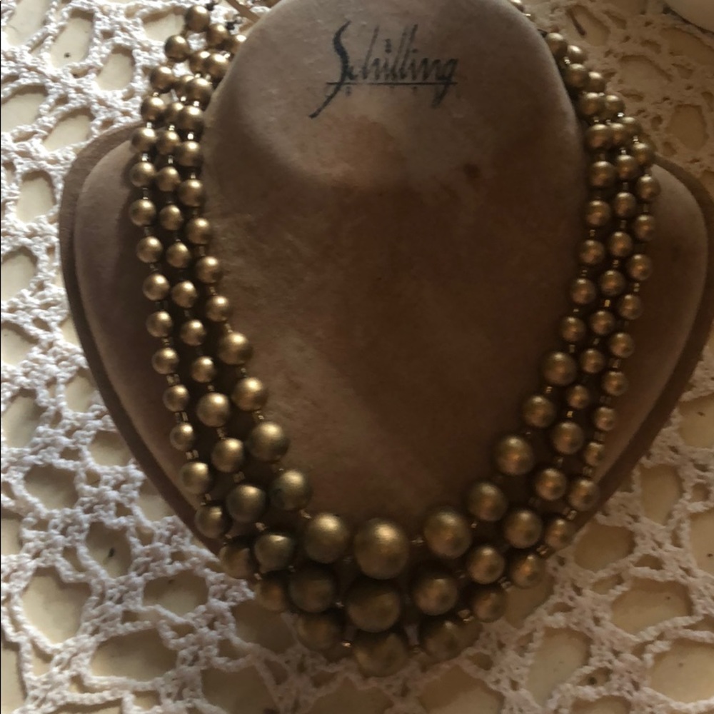 Gold tone bead tier necklace